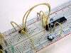 Learn construction techniques such as solderless breadboarding.